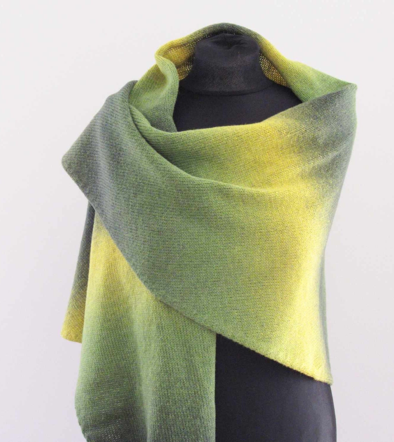 Knitted Triangle Wool Shawl in Green and Yellow Gradient.