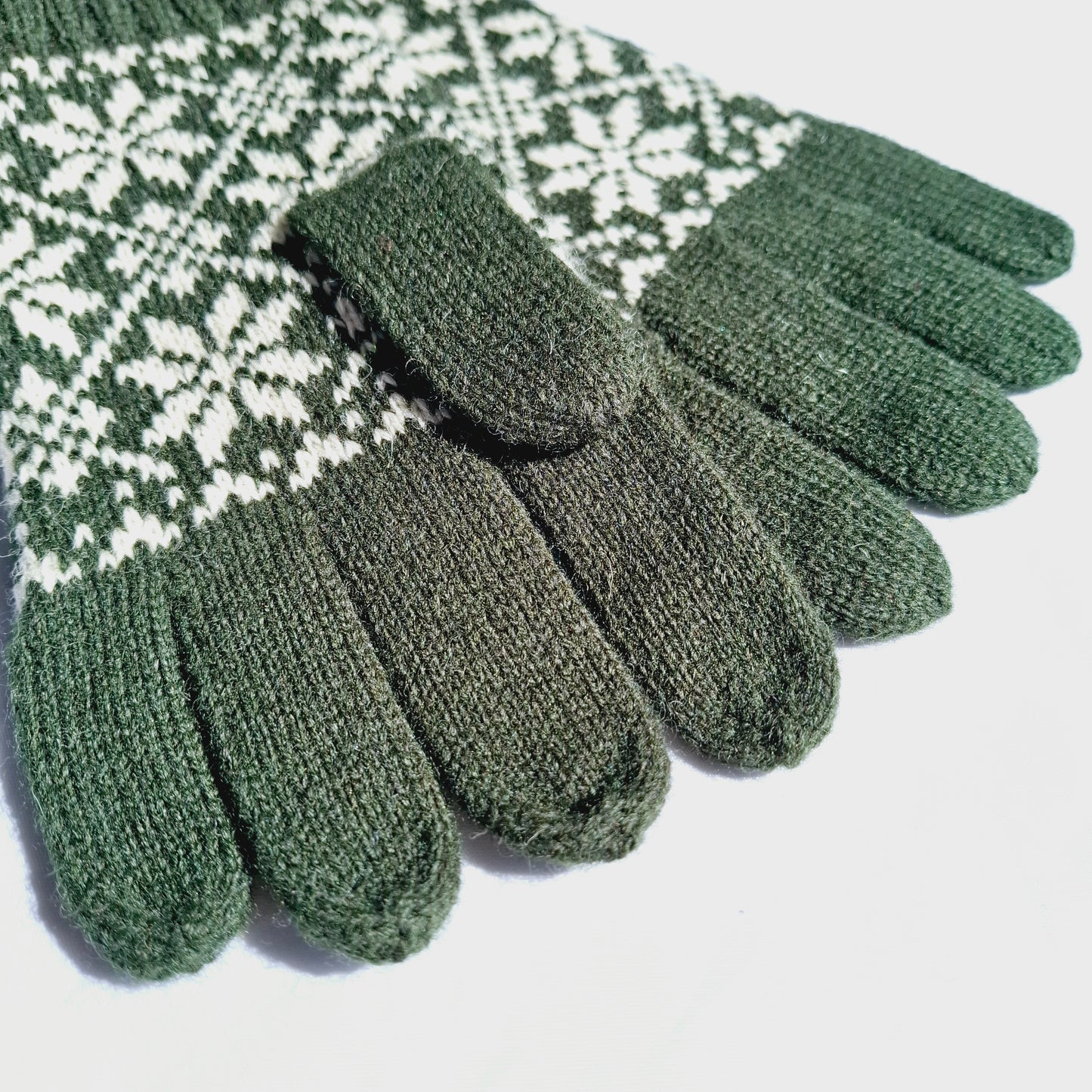 Knitted Wool Gloves in Dark Green with White Stars.