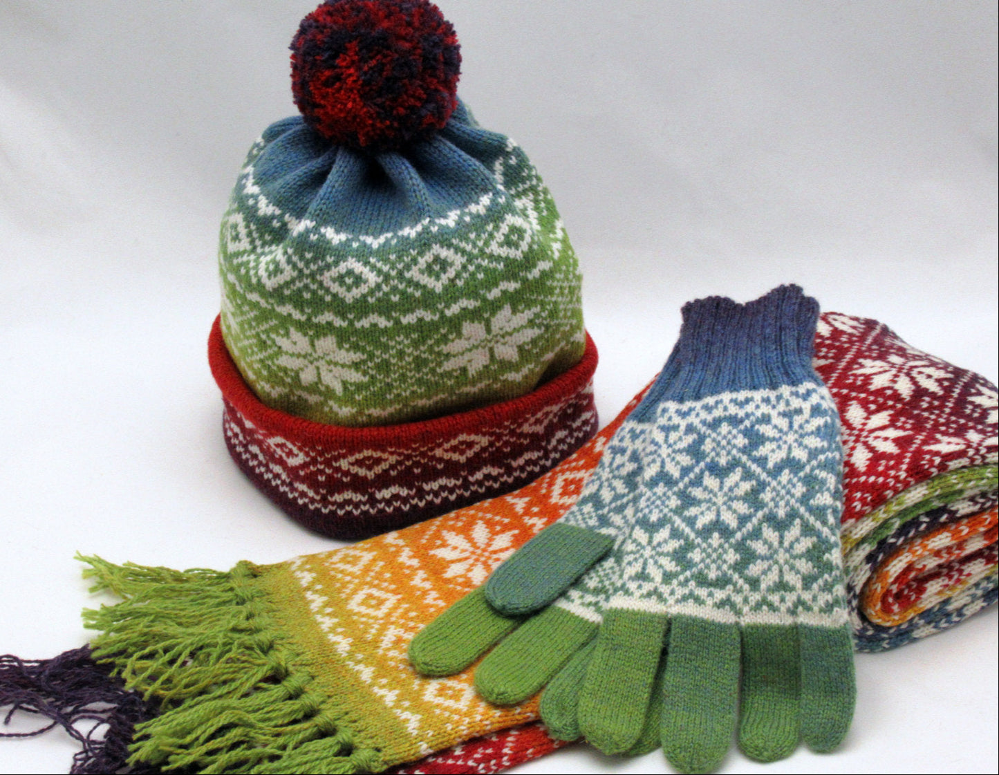 Knitted Wool Beanie in Rainbow Gradient.