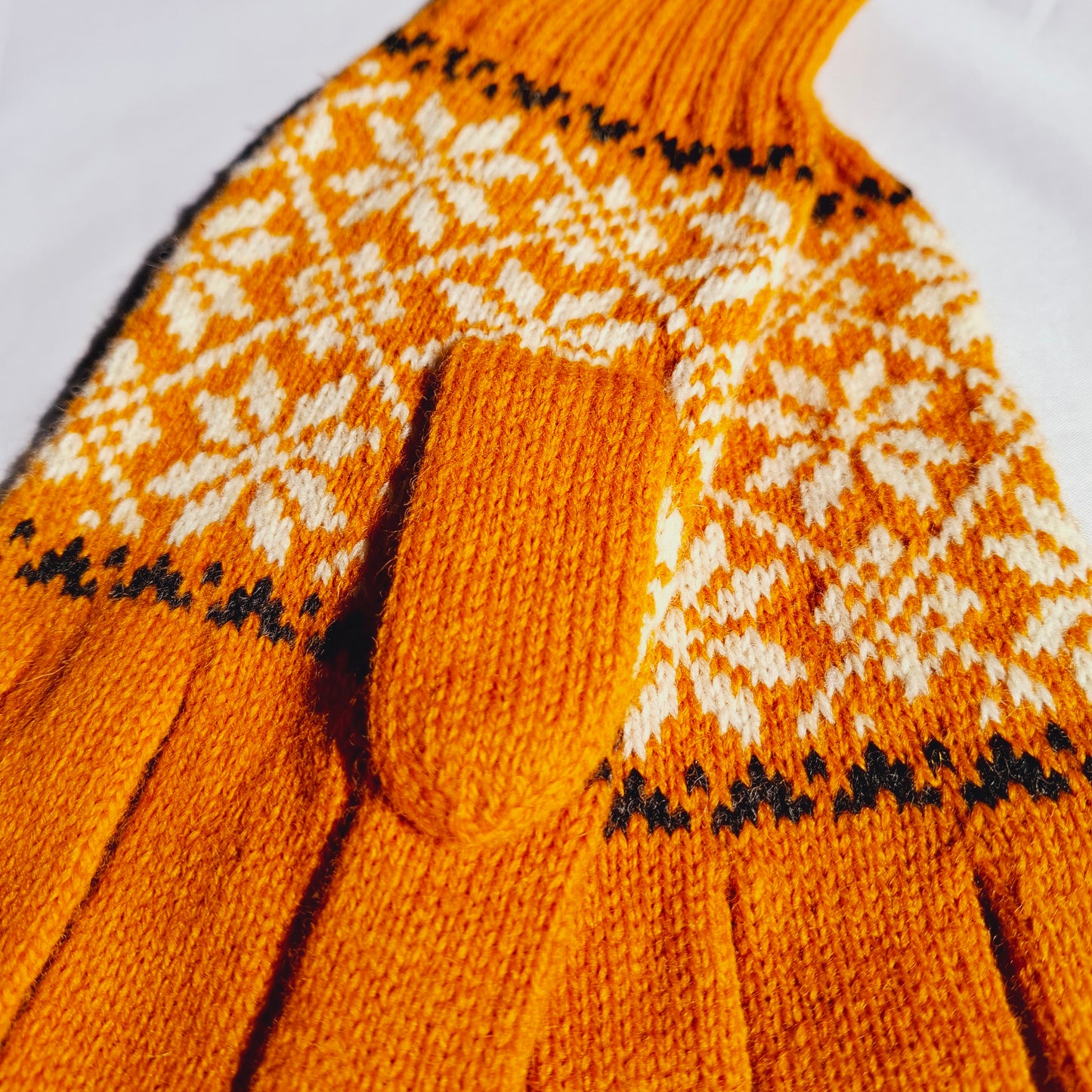 Knitted Wool Gloves in Orange  with  White Stars.